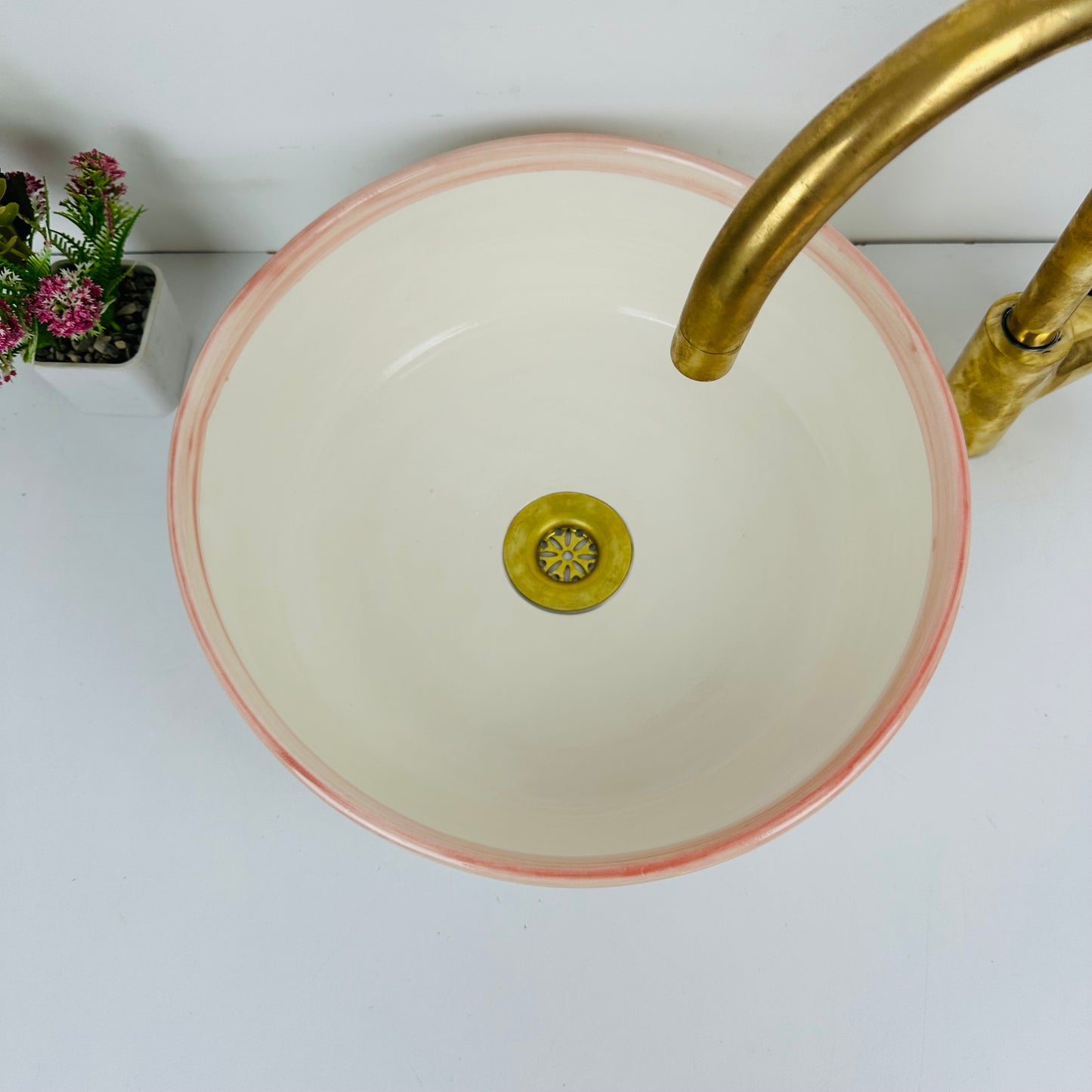 Round Elegance: Handcrafted Ceramic Sink with Pink Top Finish