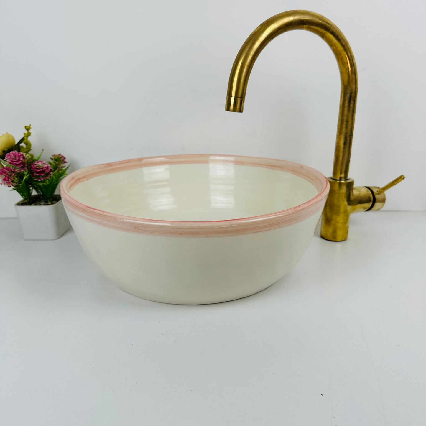 Round Elegance: Handcrafted Ceramic Sink with Pink Top Finish