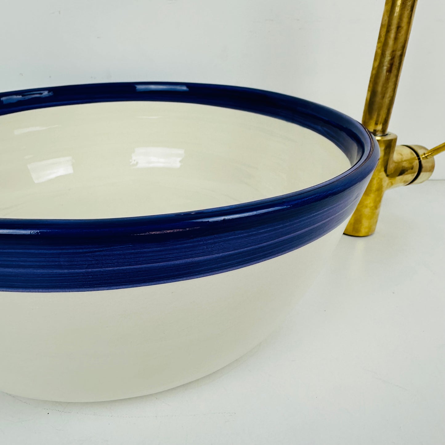 Round Elegance: Handcrafted Ceramic Sink with Dark blue Top Finish
