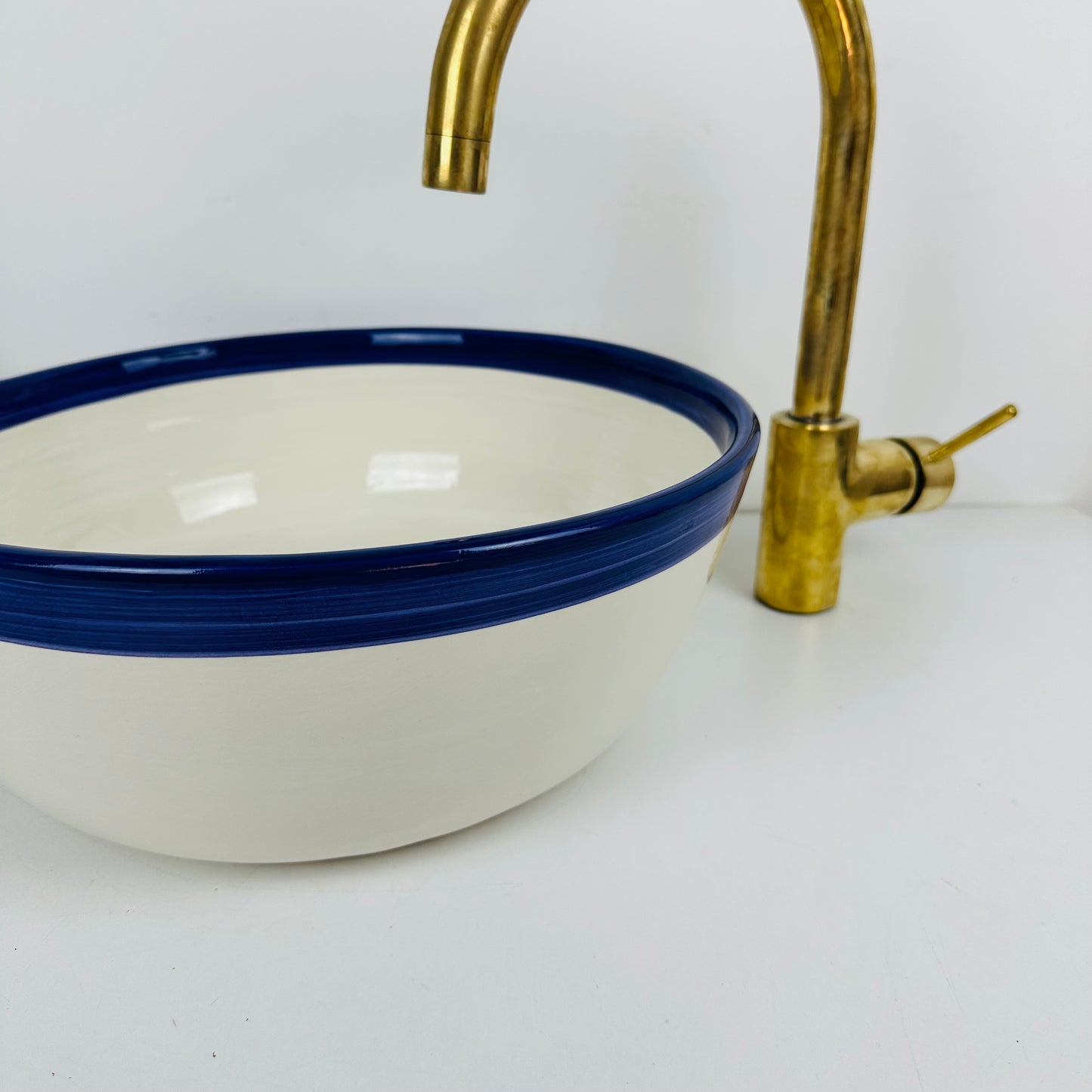 Round Elegance: Handcrafted Ceramic Sink with Dark blue Top Finish