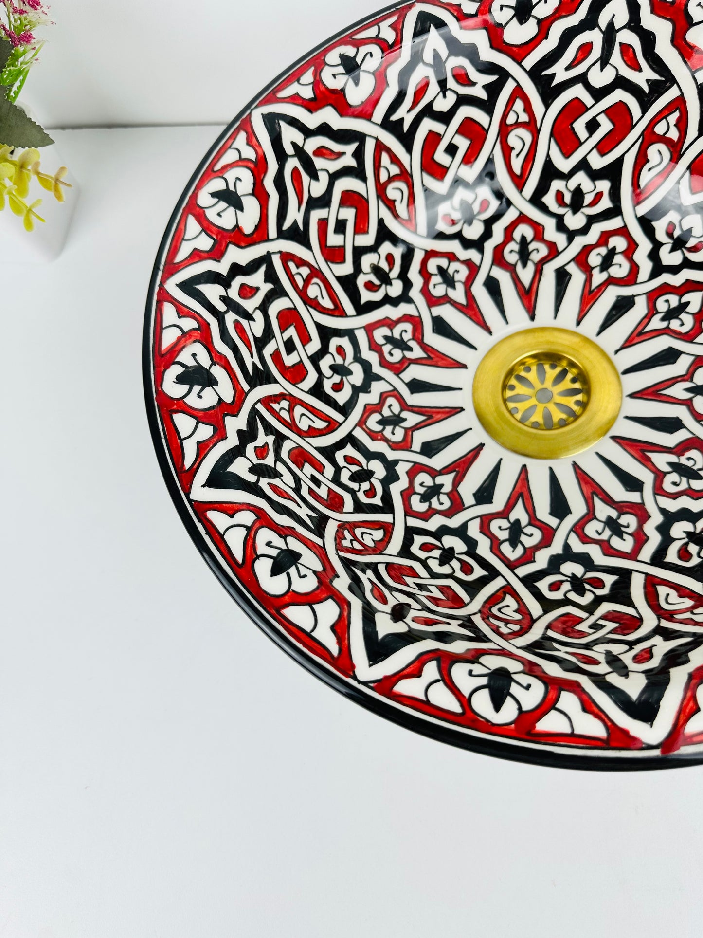 Timeless Contrast: Handcrafted Ceramic Sink with Classic Black and Red Accents