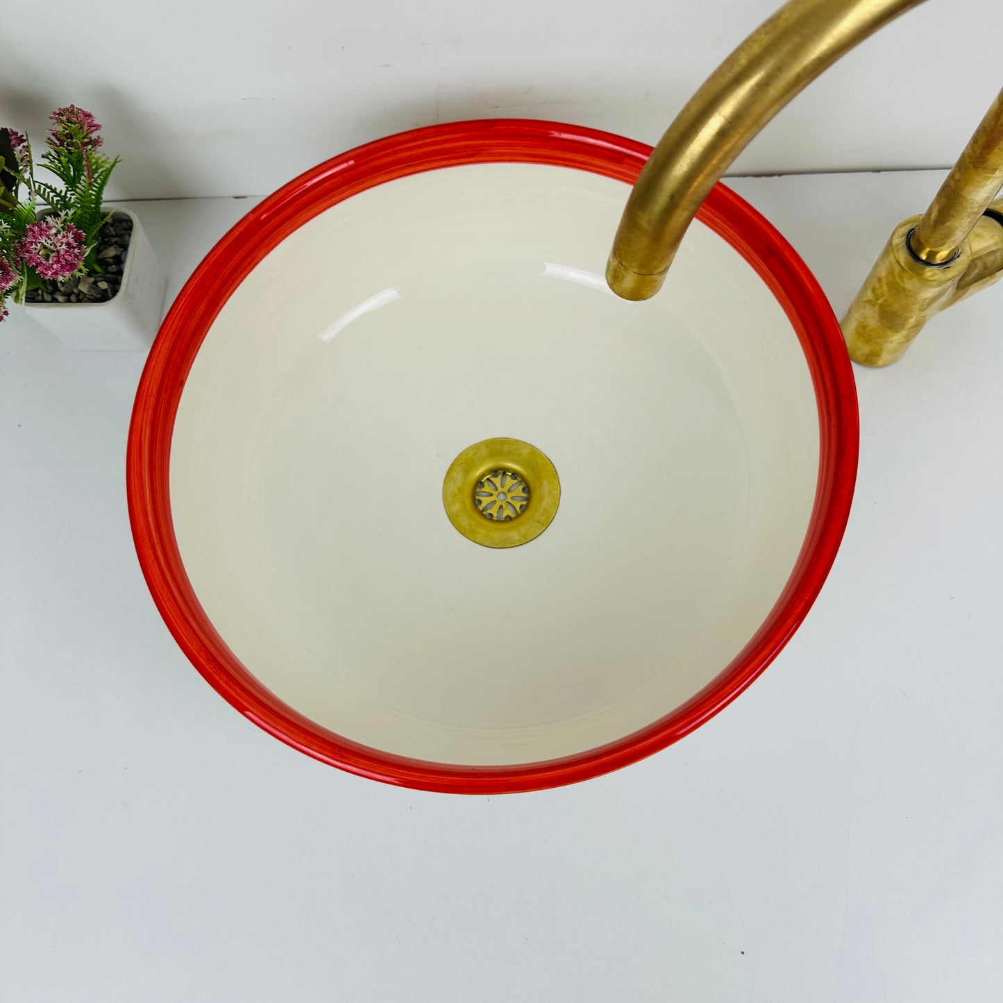 Round Elegance: Handcrafted Ceramic Sink with Red Top Finish
