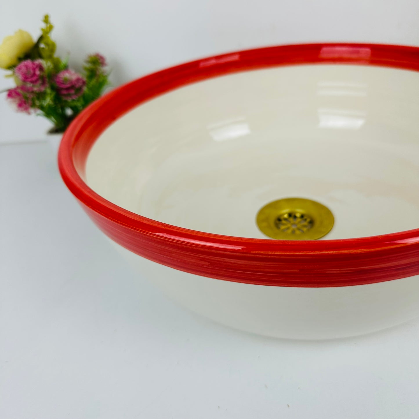Round Elegance: Handcrafted Ceramic Sink with Red Top Finish