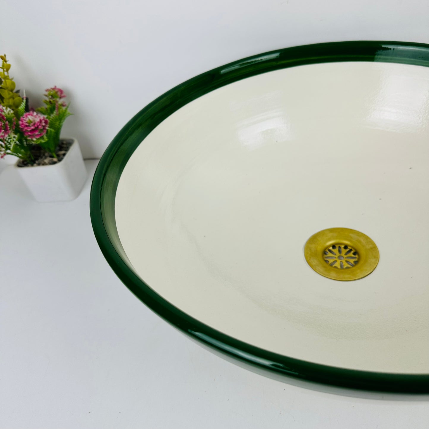 Round Elegance: Handcrafted Ceramic Sink with Green Top Finish