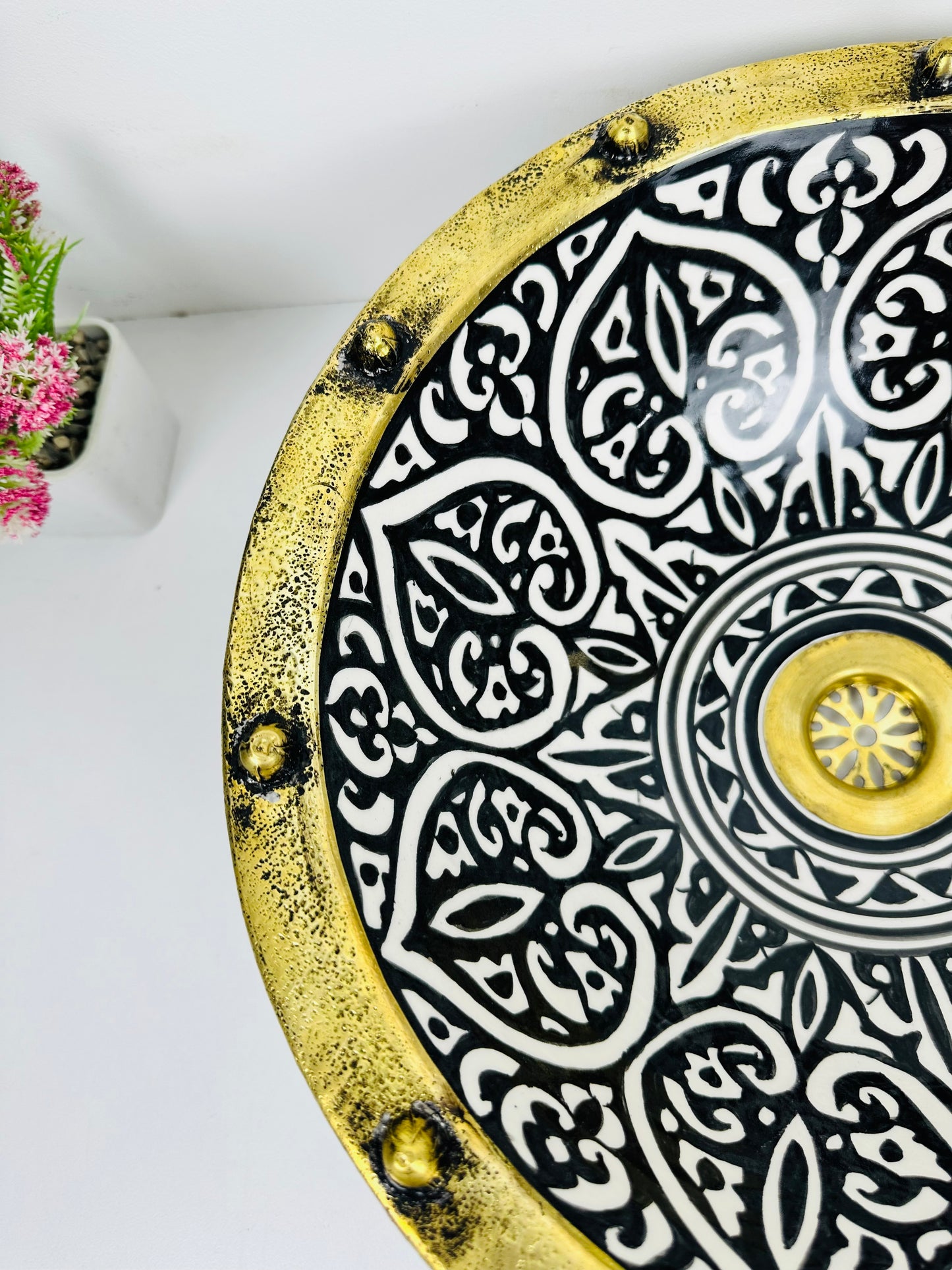 Inkwell Creations: Handcrafted Ceramic Sink with artisanal Black Shapes and brass touch