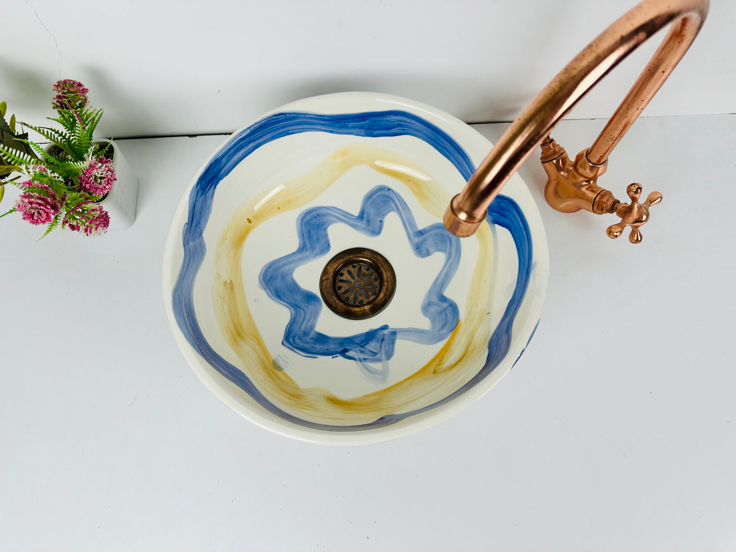 Sunset Seas: Modern Handcrafted Ceramic Sink with Blue and Yellow Wave Motifs