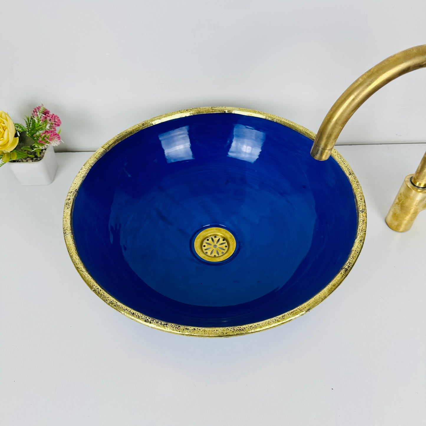 Sapphire Majesty: Handcrafted Ceramic Sink with Dark Blue and Gold Brass Accent