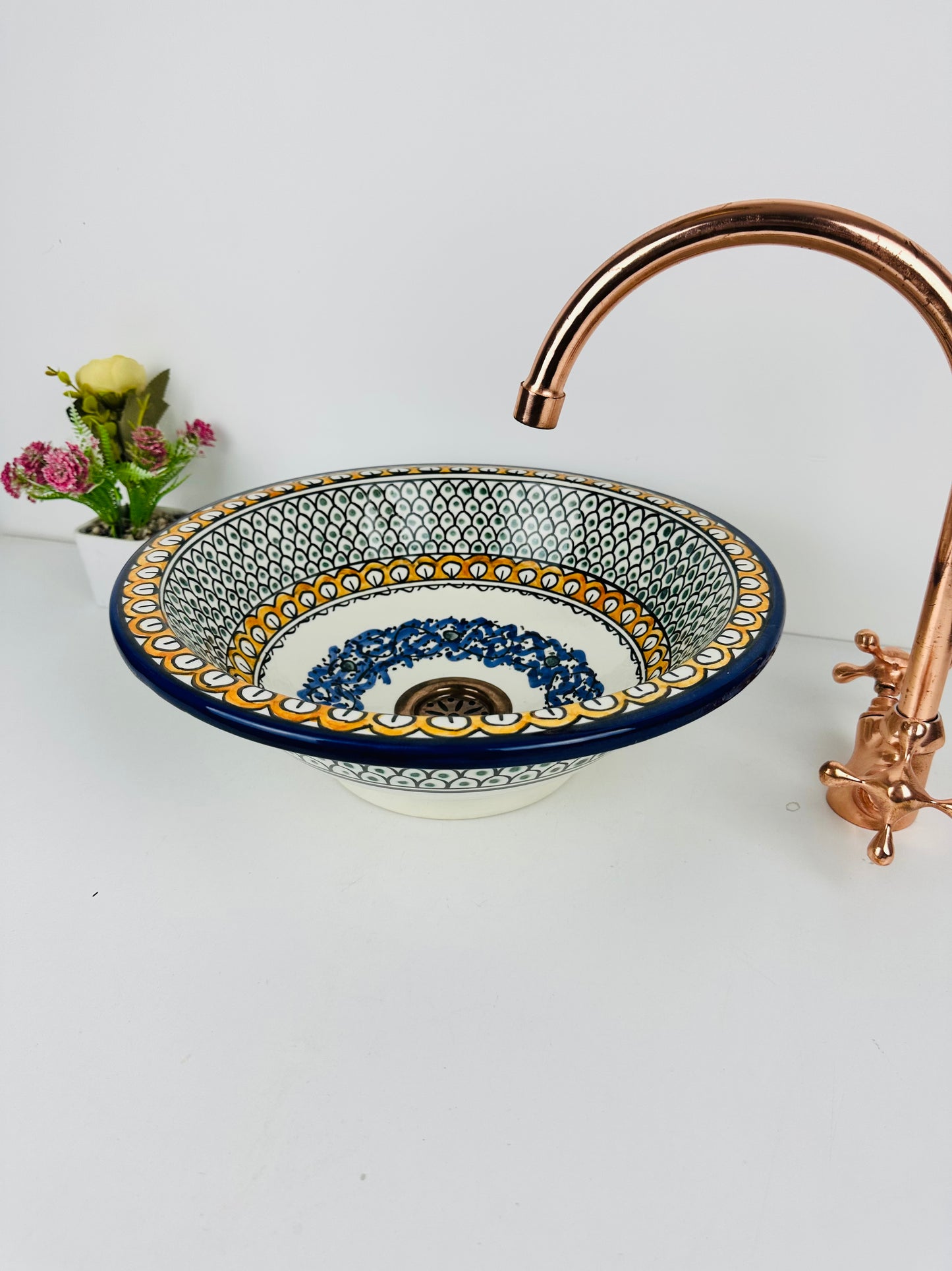Tropical Fusion: Handcrafted Ceramic Sink with Orange and Blue Accents