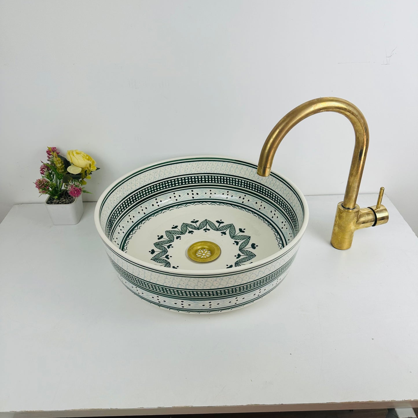 Shades of Green: Handcrafted Ceramic Sink with Varied Green Tones