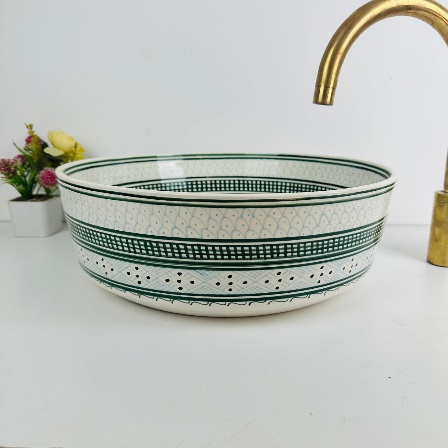 Shades of Green: Handcrafted Ceramic Sink with Varied Green Tones