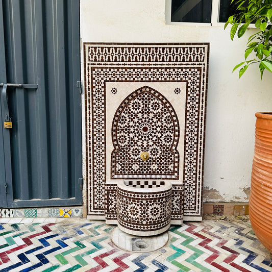 elegant Moroccan Zellige fountain in earthy brown and cream tones