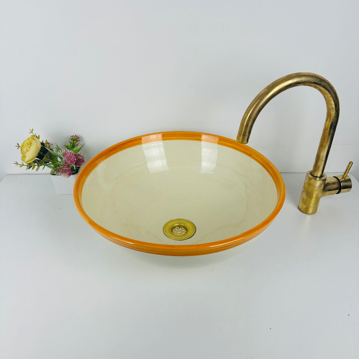 Round Elegance: Handcrafted Ceramic Sink with Orange Top Finish
