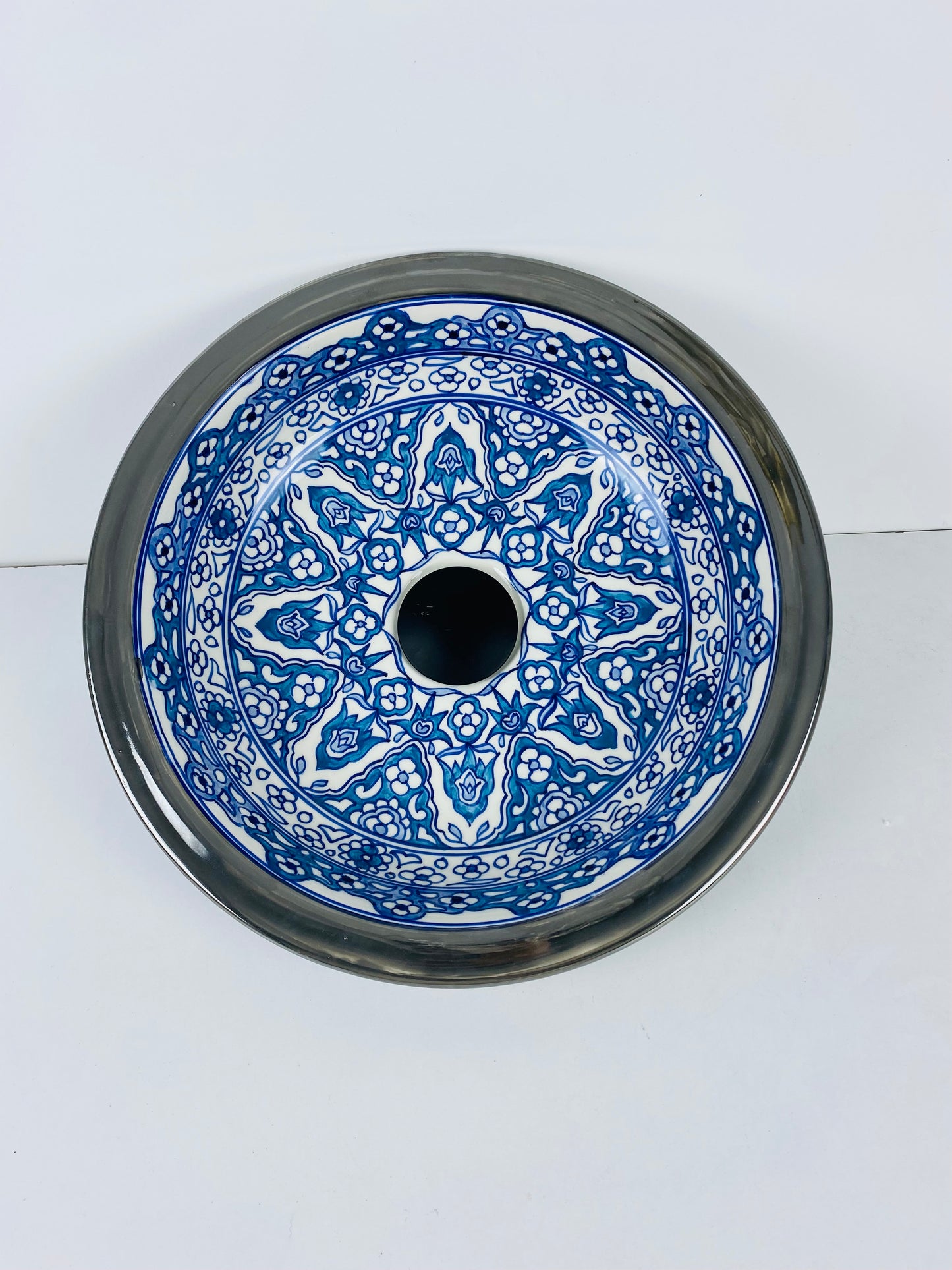 Azure Bloom Steel-Edged Vessel Sink Platinum Rim Accents