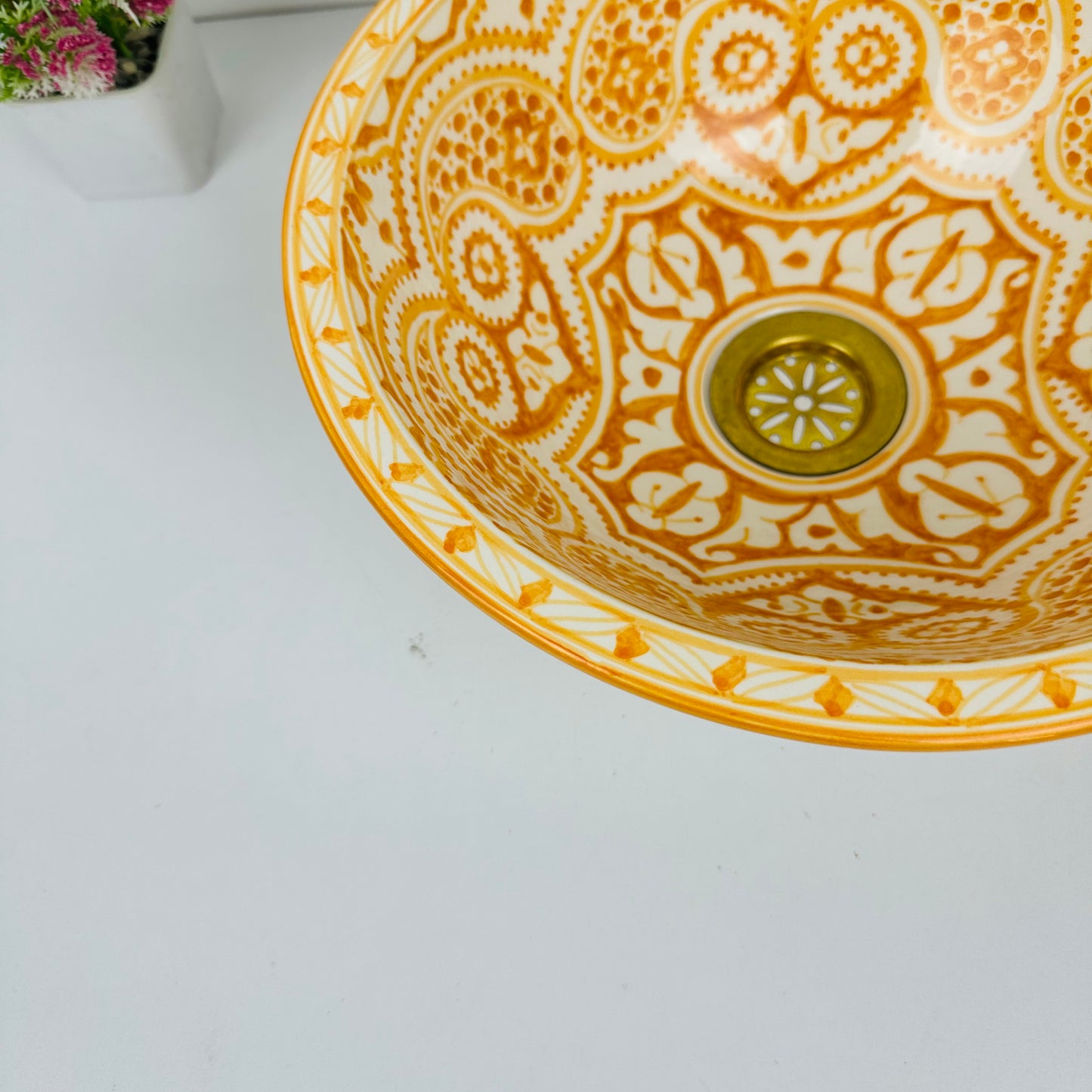 Artisan's Palette: Handcrafted Ceramic Sink with Vibrant orange Coloration