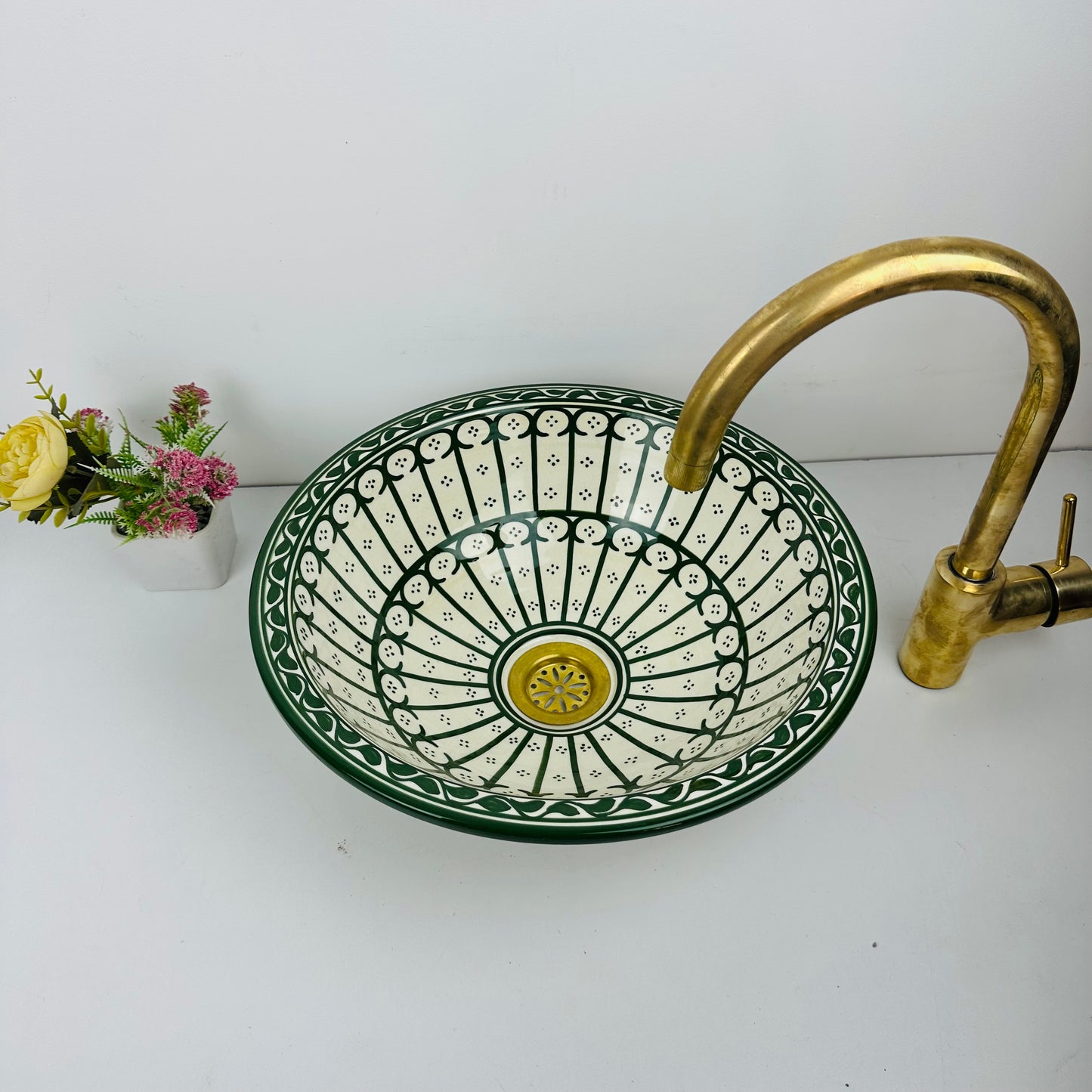 Verdant Enclosure: Handcrafted Ceramic Sink with Green Fence Design