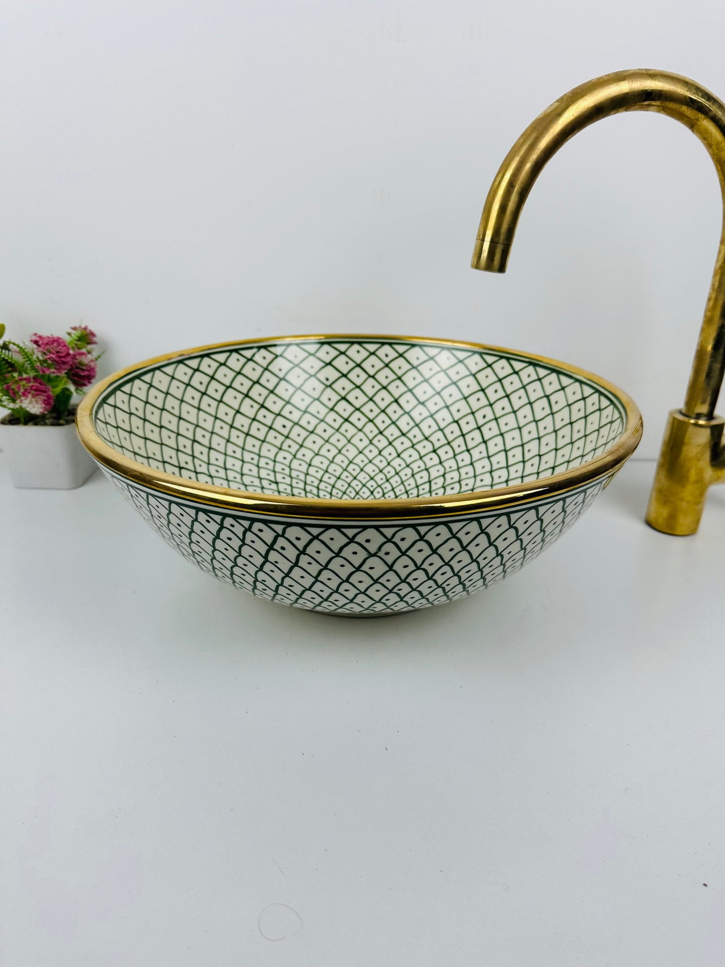 14k gold Emerald Xscape: Handcrafted Ceramic Sink with X-Shaped Designs in Green