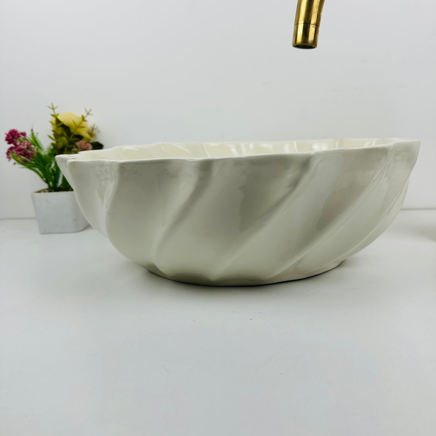 Sandy Waves: Handcrafted Beige Ceramic Sink with Wave-Inspired Design