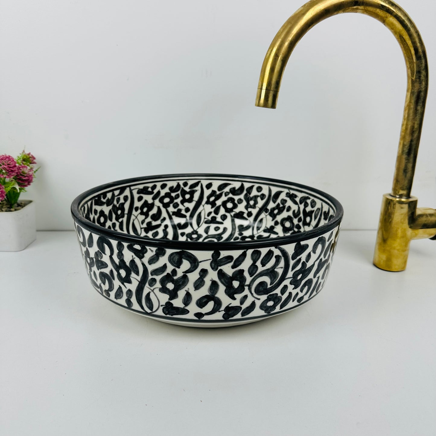 Black Botanical Haven: Handcrafted Ceramic Sink with Garden-Inspired Motifs