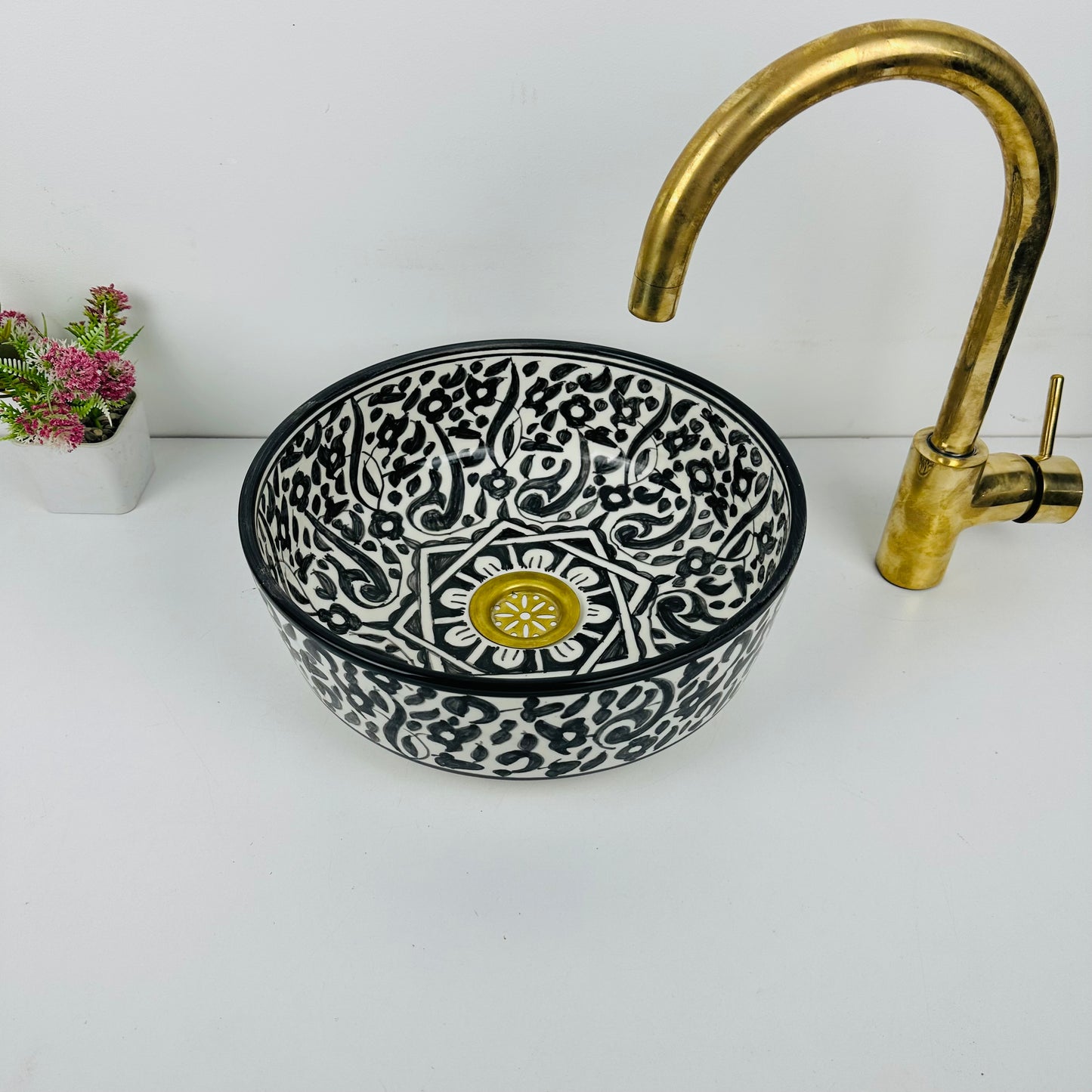 Black Botanical Haven: Handcrafted Ceramic Sink with Garden-Inspired Motifs