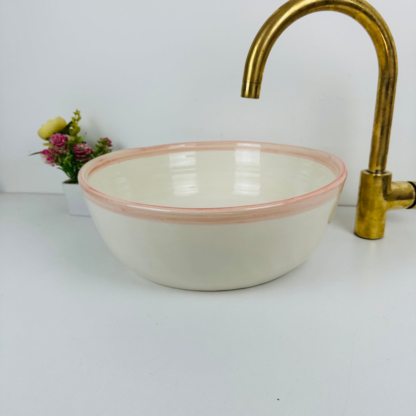 Round Elegance: Handcrafted Ceramic Sink with Pink Top Finish