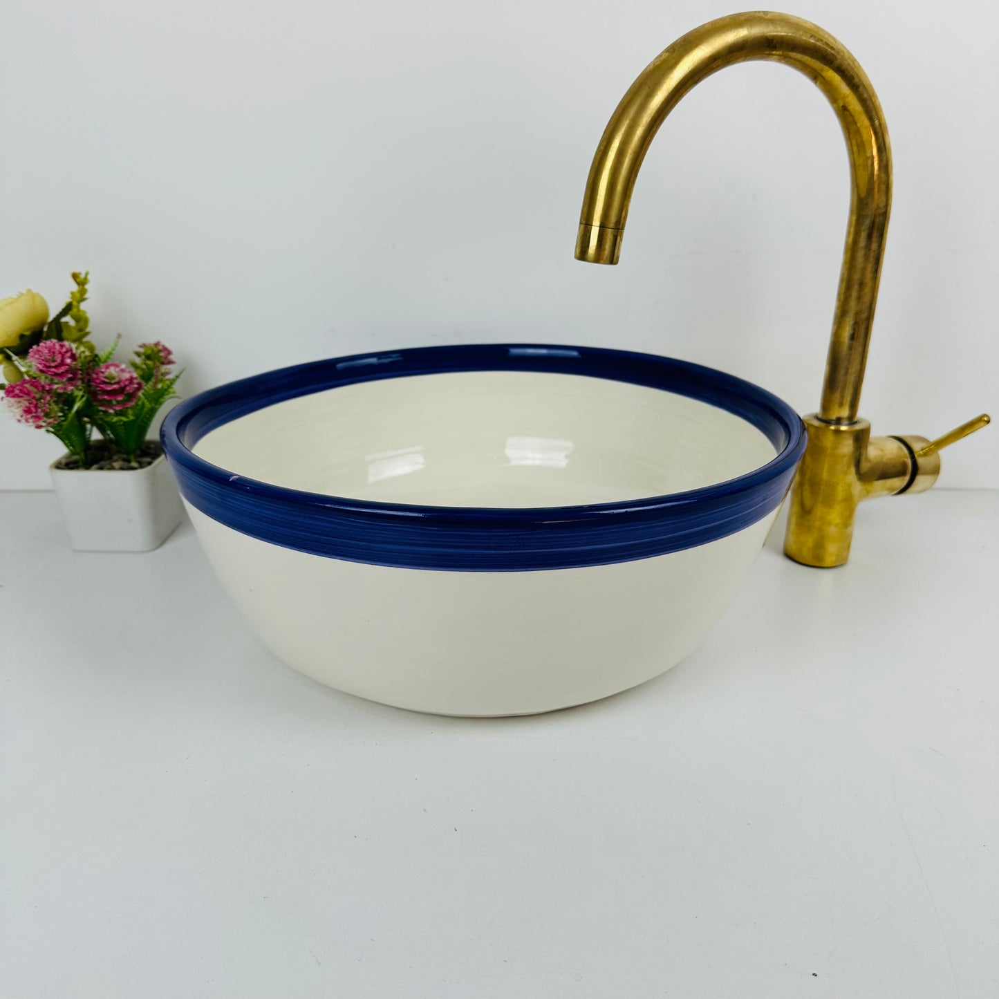 Round Elegance: Handcrafted Ceramic Sink with Dark blue Top Finish