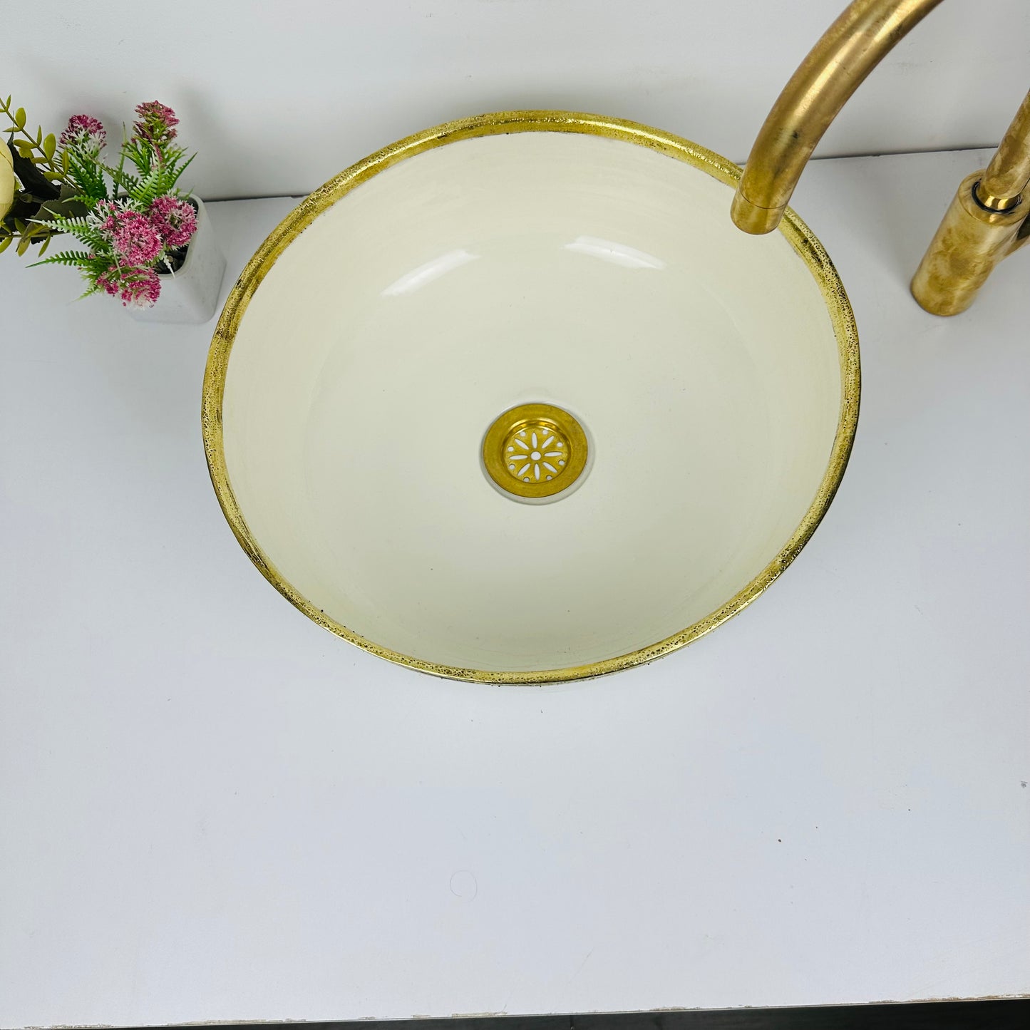 Timeless Elegance: Handcrafted Beige Ceramic Sink with Brass Accents