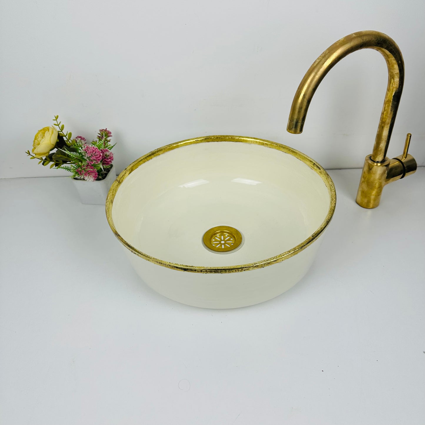 Timeless Elegance: Handcrafted Beige Ceramic Sink with Brass Accents