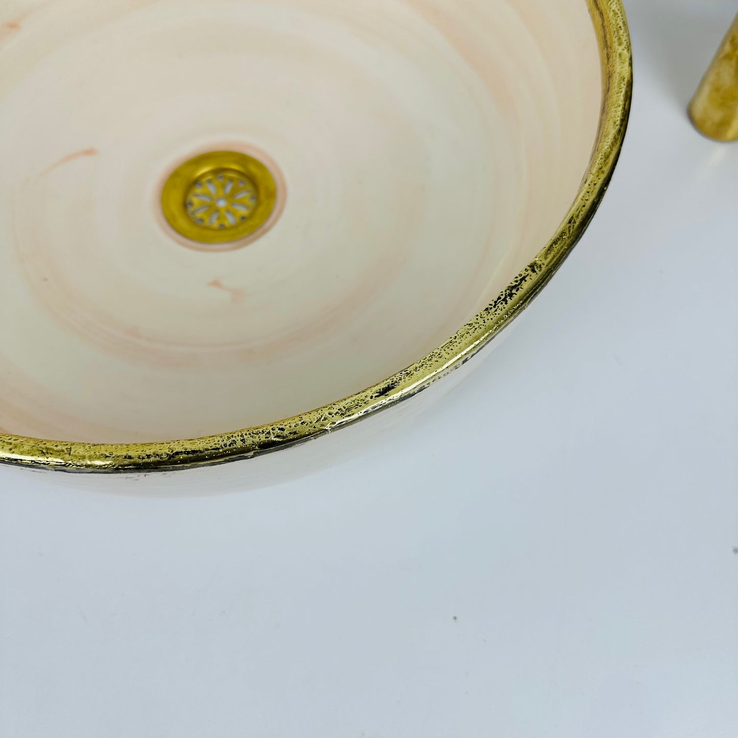 Timeless Elegance: Handcrafted Light Orange Ceramic Sink with Brass Accents