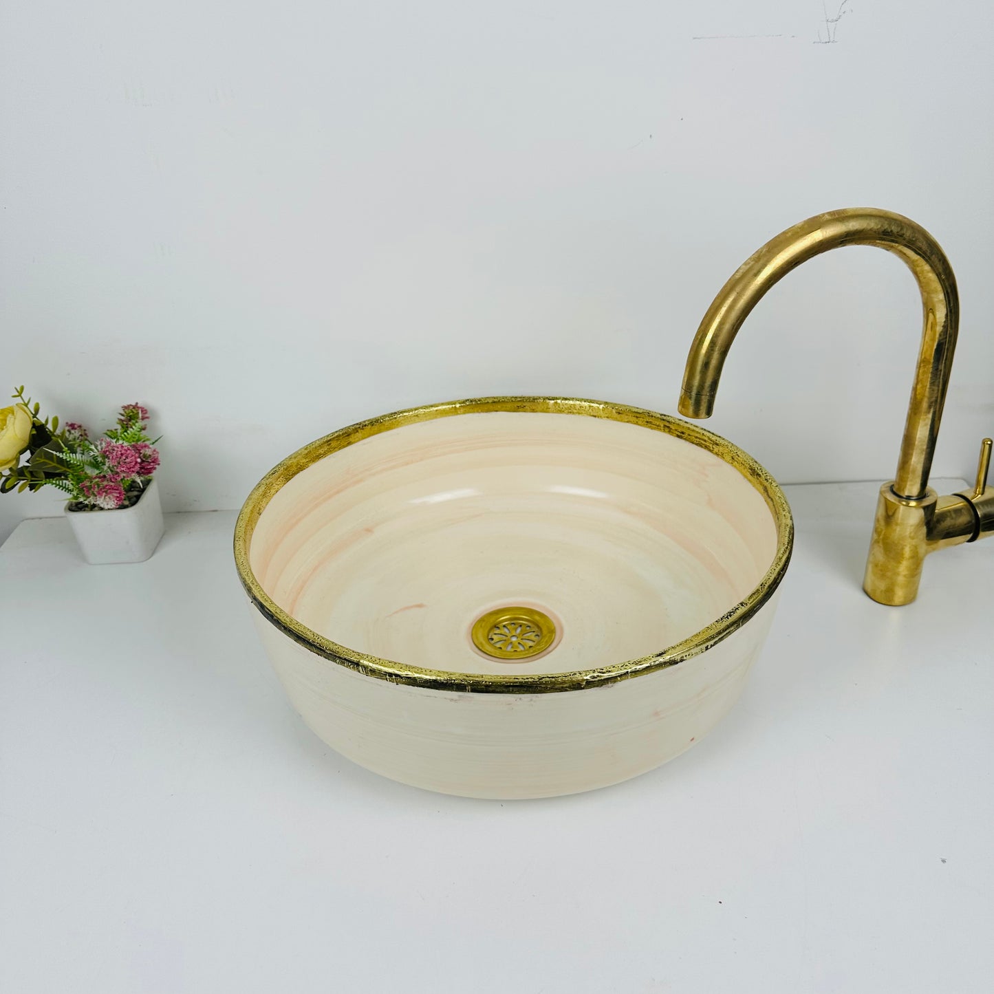 Timeless Elegance: Handcrafted Light Orange Ceramic Sink with Brass Accents