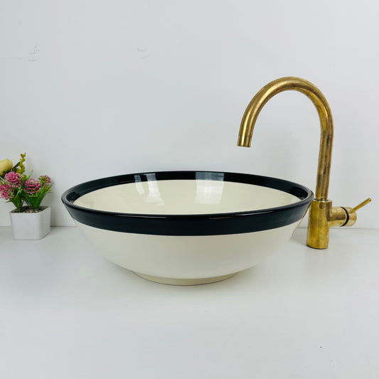 Round Elegance: Handcrafted Ceramic Sink with Black Top Finish