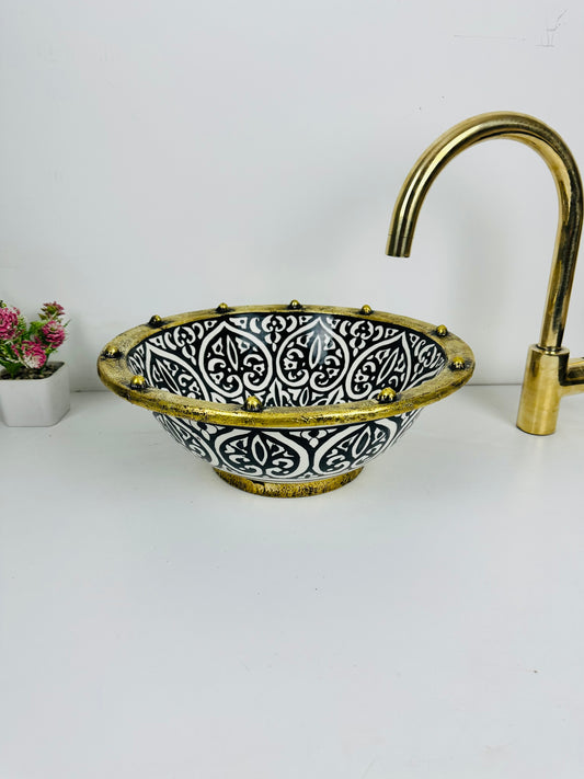 Inkwell Creations: Handcrafted Ceramic Sink with artisanal Black Shapes and brass touch