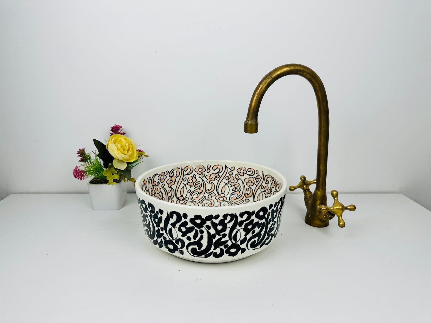 wilight Oasis: Handcrafted Ceramic Sink with Black Garden Exterior and Light Orange Interior