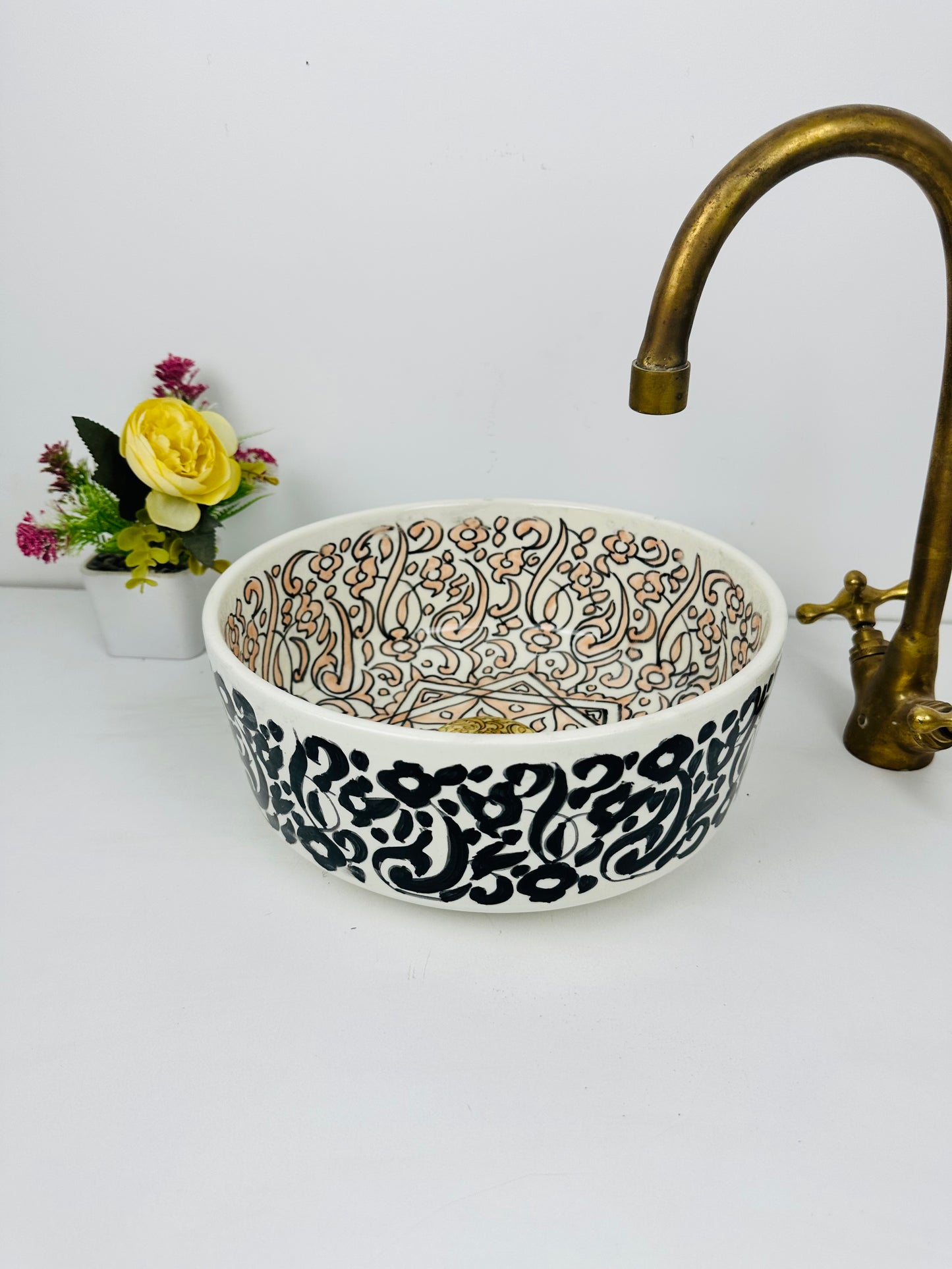 wilight Oasis: Handcrafted Ceramic Sink with Black Garden Exterior and Light Orange Interior