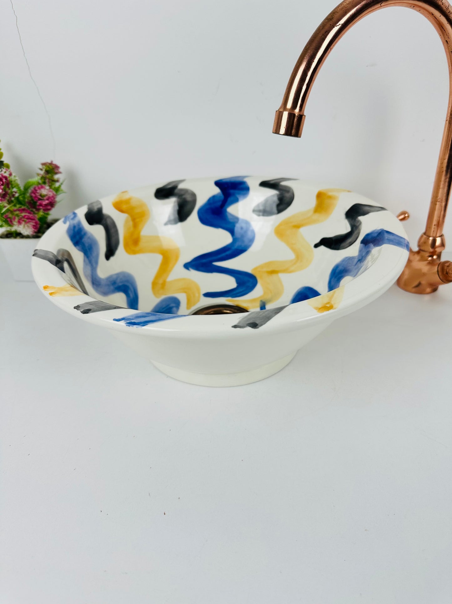 Midnight Tide: Handcrafted Ceramic Sink with Black, Blue, and Orange Swirling Patterns