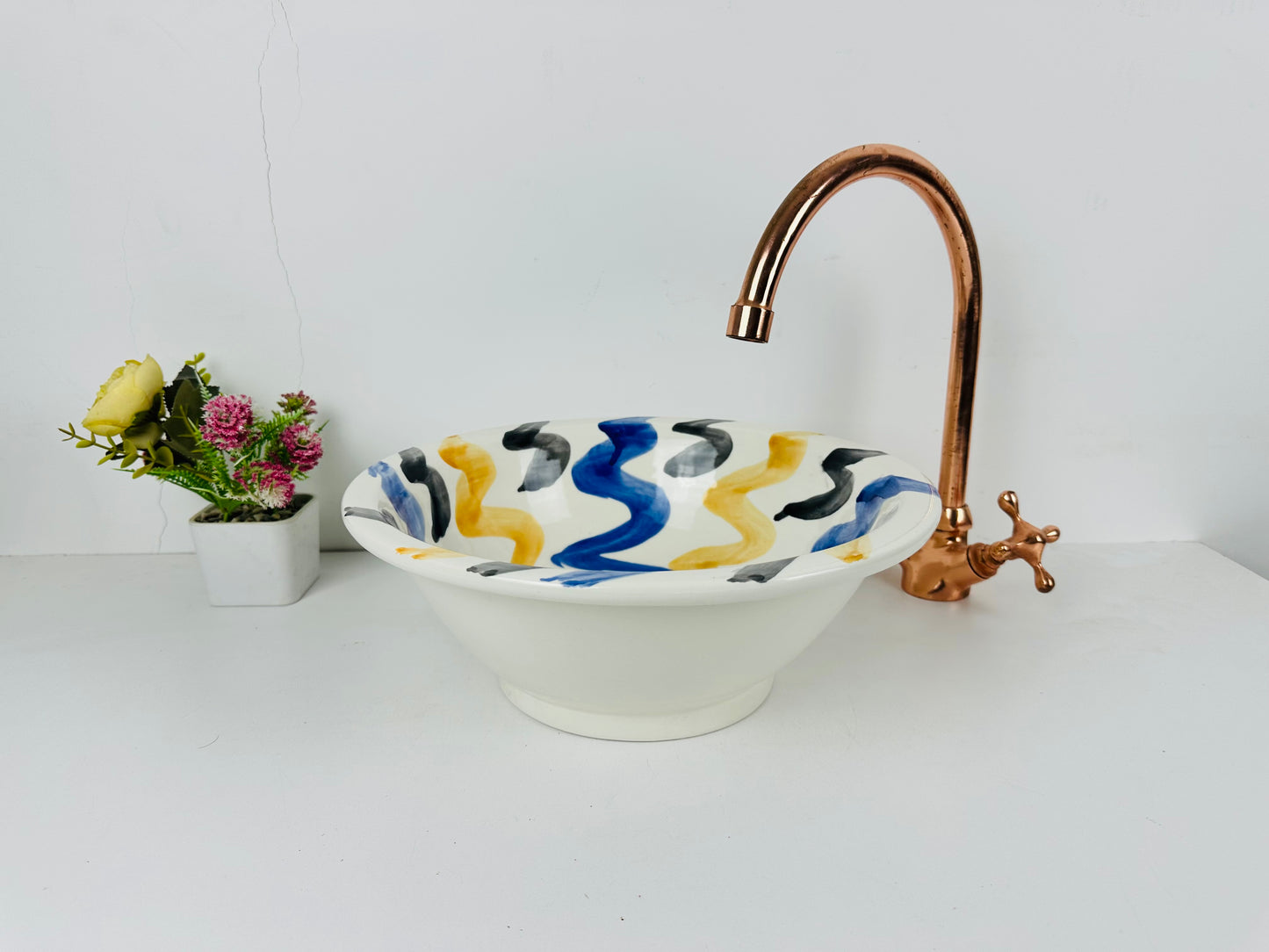 Midnight Tide: Handcrafted Ceramic Sink with Black, Blue, and Orange Swirling Patterns