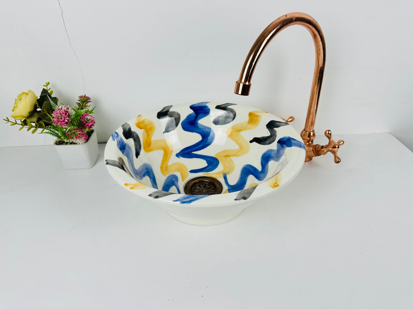 Midnight Tide: Handcrafted Ceramic Sink with Black, Blue, and Orange Swirling Patterns