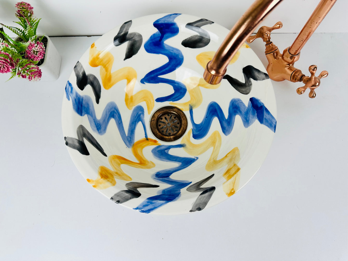 Midnight Tide: Handcrafted Ceramic Sink with Black, Blue, and Orange Swirling Patterns