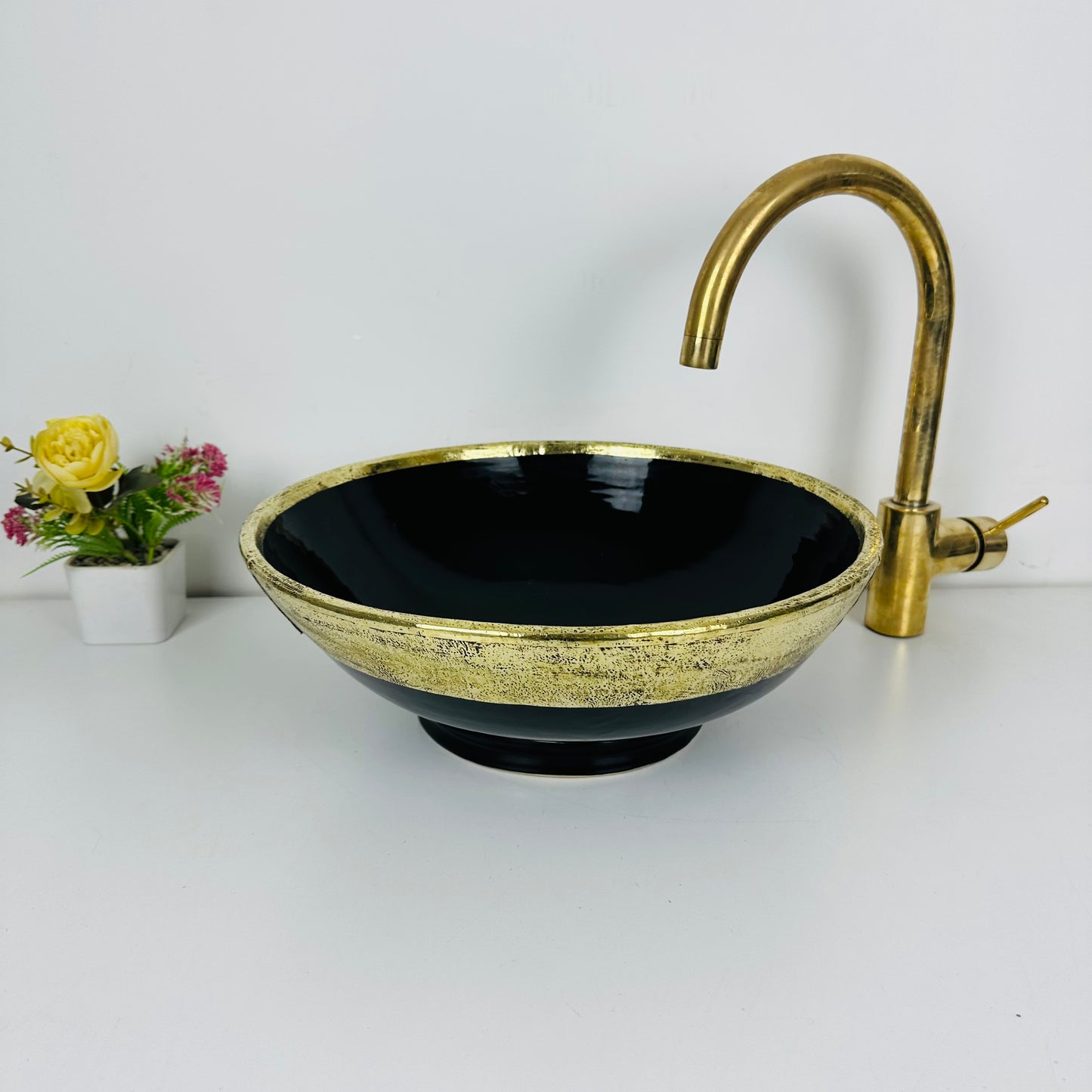 Midnight golden Black: Handcrafted Ceramic Sink with Black Finish and Gold Brass Accents