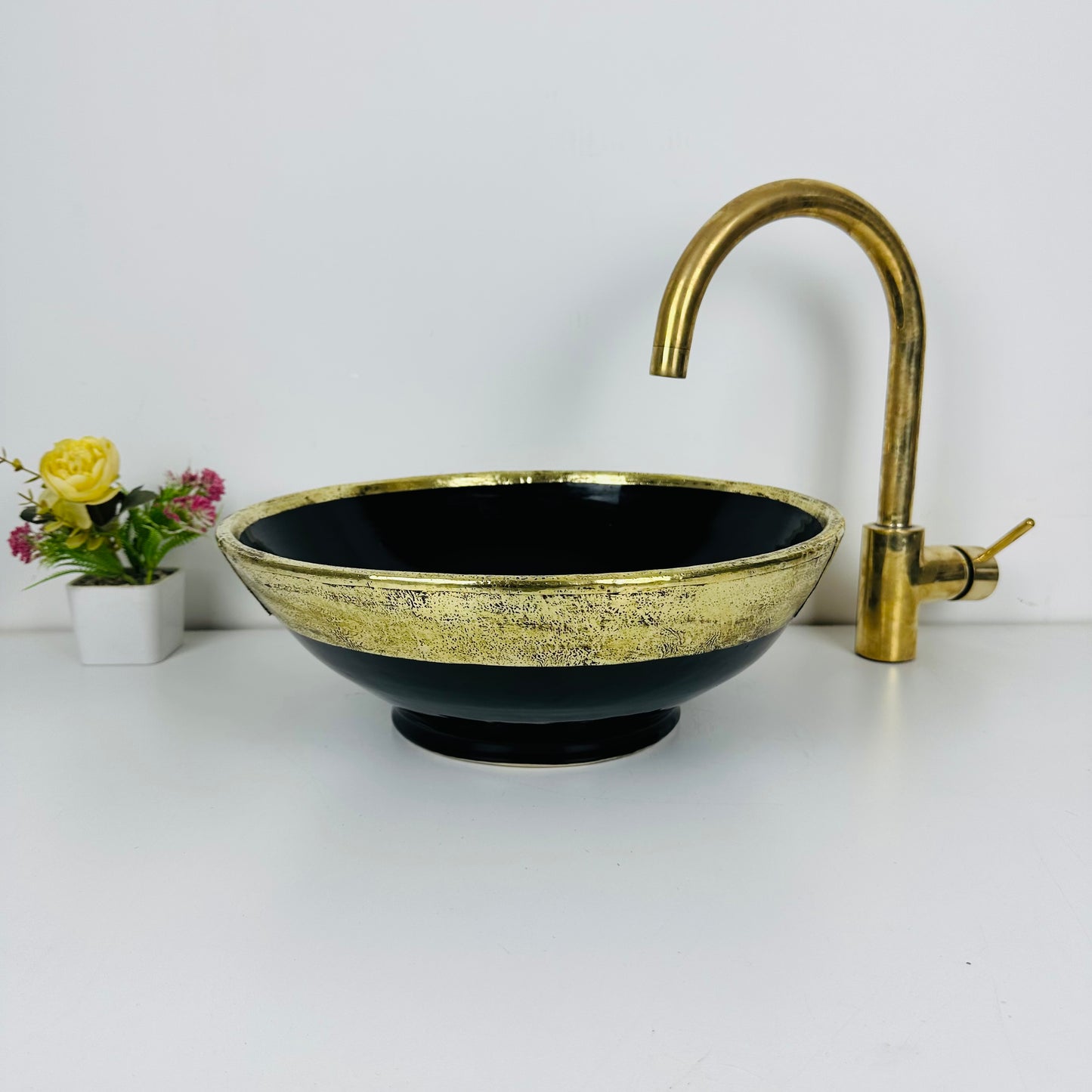 Midnight golden Black: Handcrafted Ceramic Sink with Black Finish and Gold Brass Accents