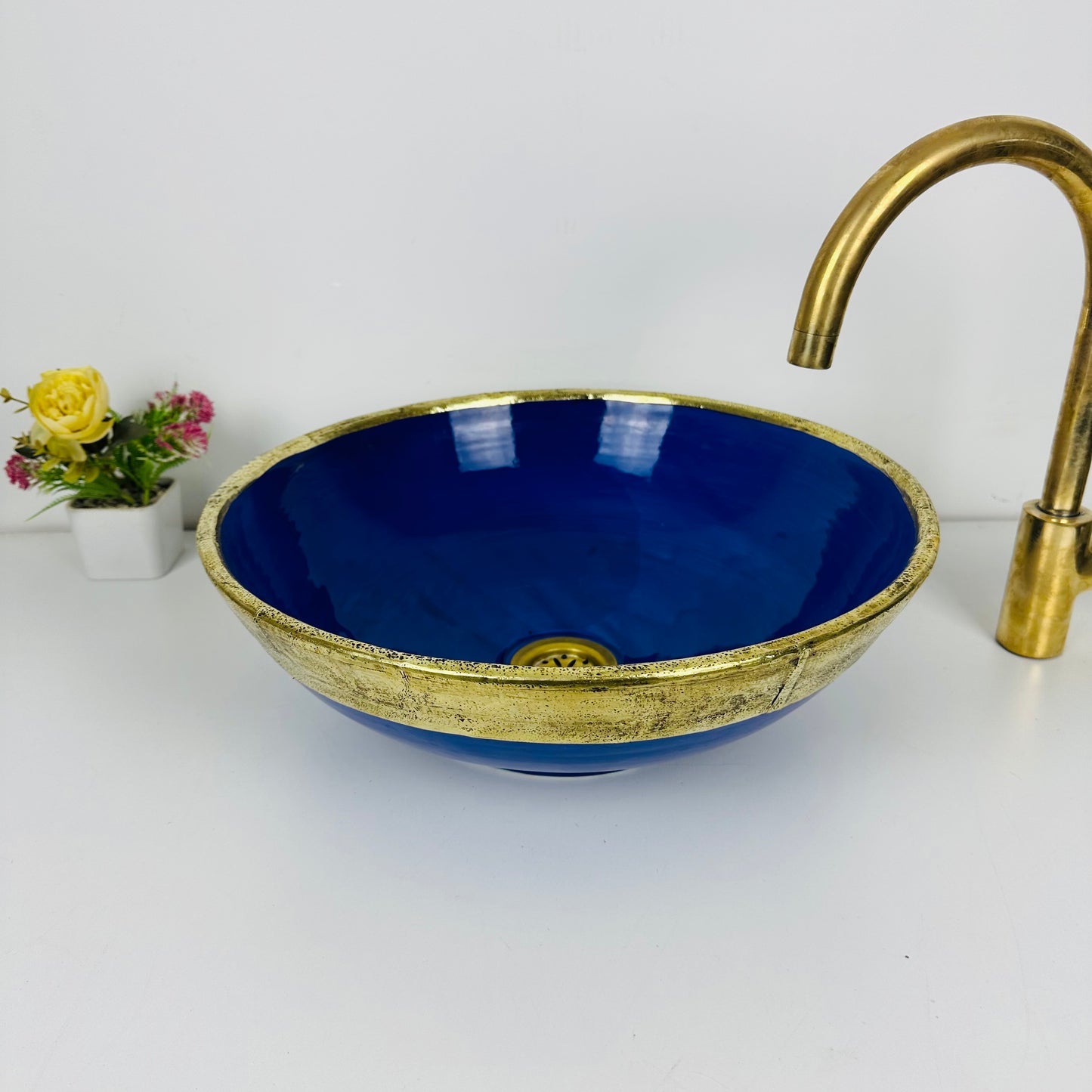 Sapphire Majesty: Handcrafted Ceramic Sink with Dark Blue and Gold Brass Accent