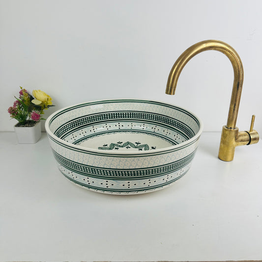 Shades of Green: Handcrafted Ceramic Sink with Varied Green Tones