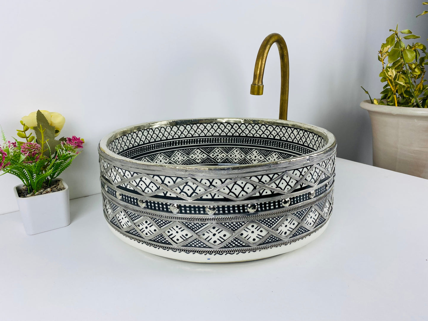 Silver Lining: Handcrafted Ceramic Sink in Black and White with Silver Brass Touches