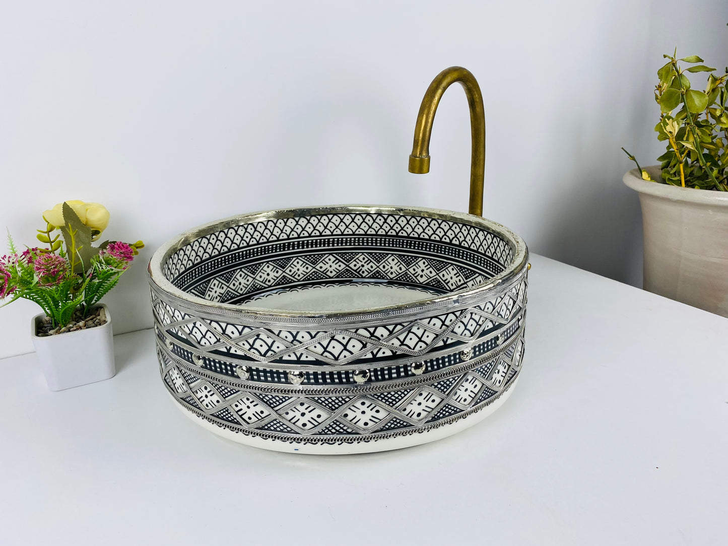 Silver Lining: Handcrafted Ceramic Sink in Black and White with Silver Brass Touches