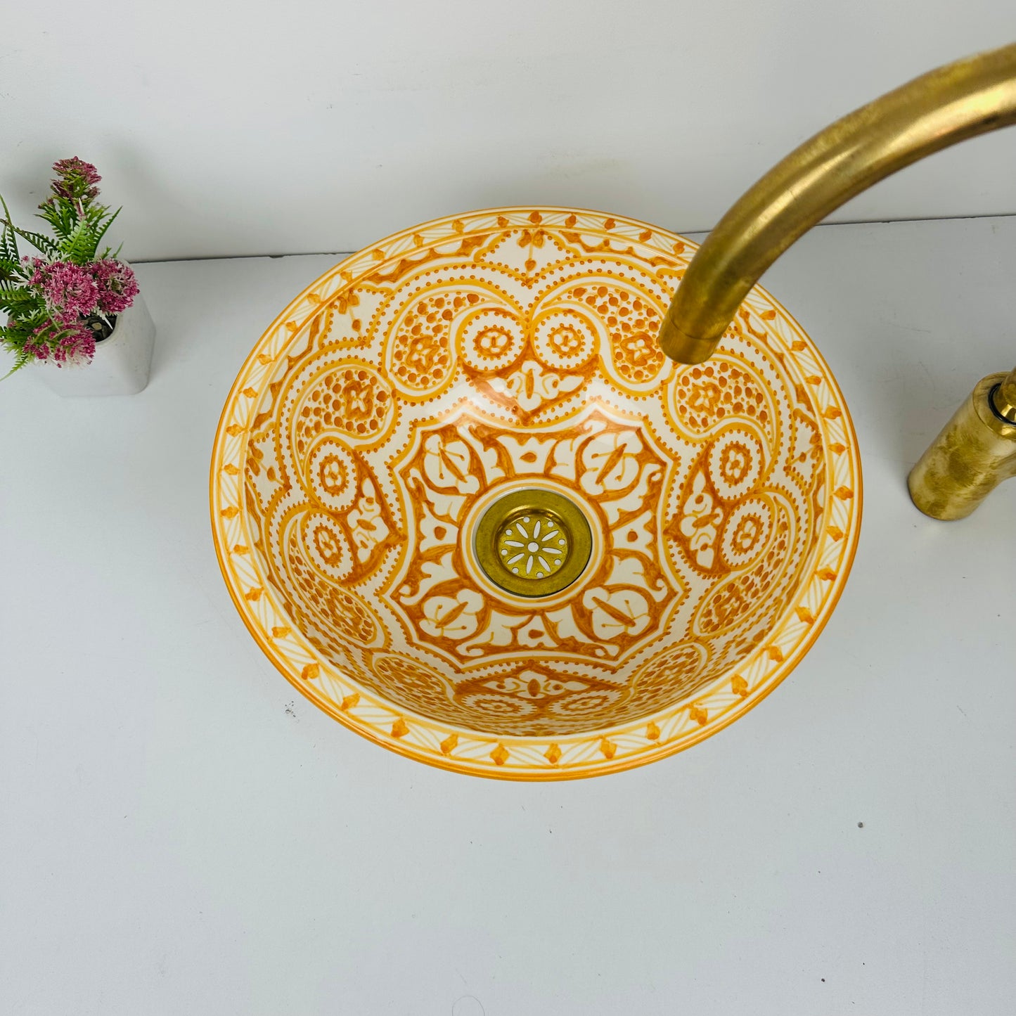 Artisan's Palette: Handcrafted Ceramic Sink with Vibrant orange Coloration