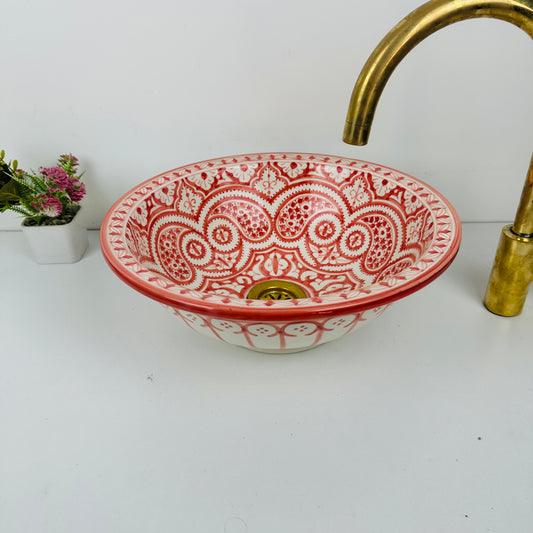 Artisan's Palette: Handcrafted Ceramic Sink with Vibrant Red Coloration